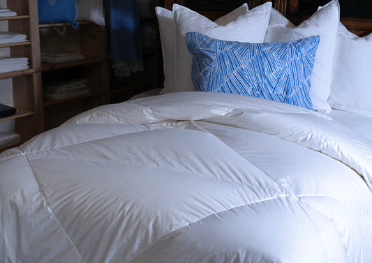 The Distinction Between a Down Comforter, Duvet, Quilt, and Blanket